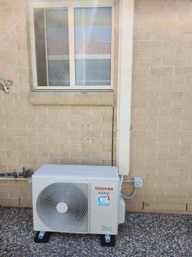 Tidy Toshiba split system outdoor unit installation